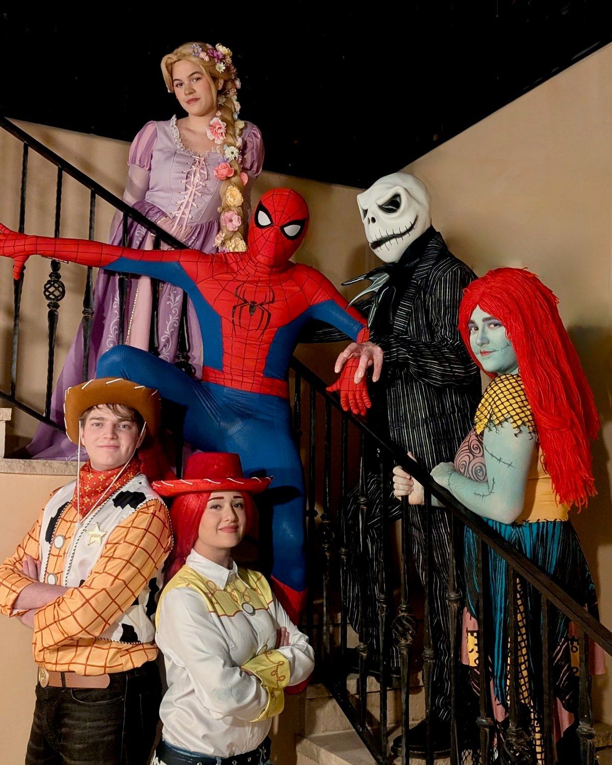 Kids party characters from The Character Squad together: a tower princess, web hero, pumpkin king, patchwork girl, cowboy and cowgirl